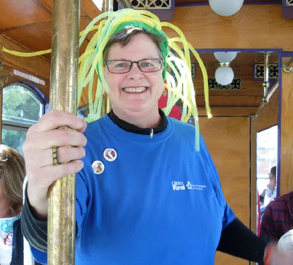 Cheerful person wearing fun headgear